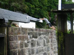 Ben beginning his push on the gate of lock number 7.