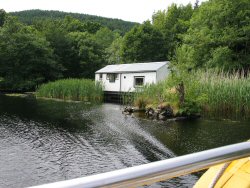 A dwelling by the side of the canal.