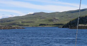 A narrow and rock strewn entrance.
