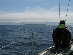 Keith enjoying the moment, Staffa approaching, Mull in the background.