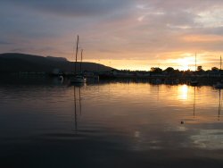 Sunset along Loch Broom and over the town of Ullapool.