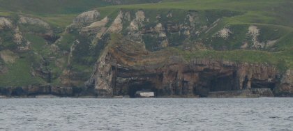 Natural arches in the clifs along the north eastern shore of Loch Eriboll.